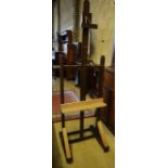 An early 19th century oak studio artist's easel, width 55cm (incorporates later timber)