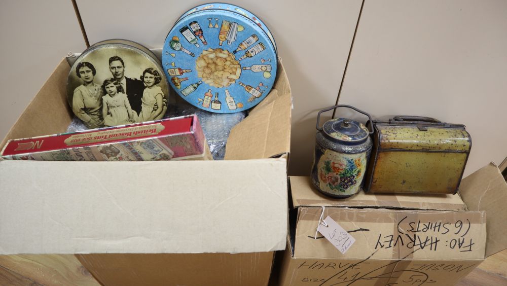 Twenty Huntley and Palmer novelty biscuit tins and a related reference book, British Biscuit Tins