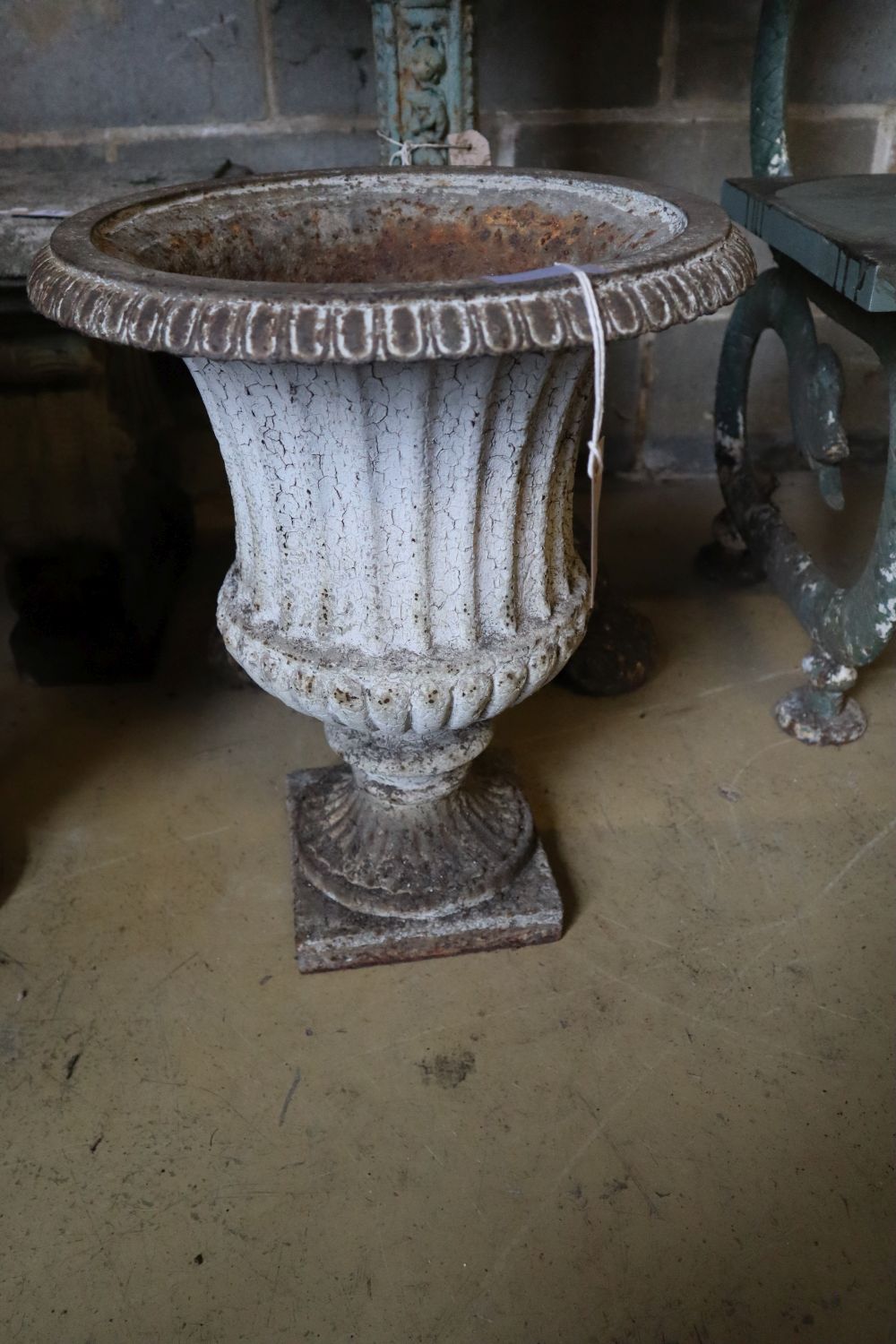 A pair of Victorian cast iron campana garden urns (one lacking plinth foot and rim), taller 49cm - Image 2 of 3