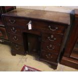 A George III walnut kneehole desk, width 90cm, depth 42cm, height 86cm