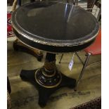 An early Victorian gilt ebonised circular slate top table, 55cm diameter, height 70cm