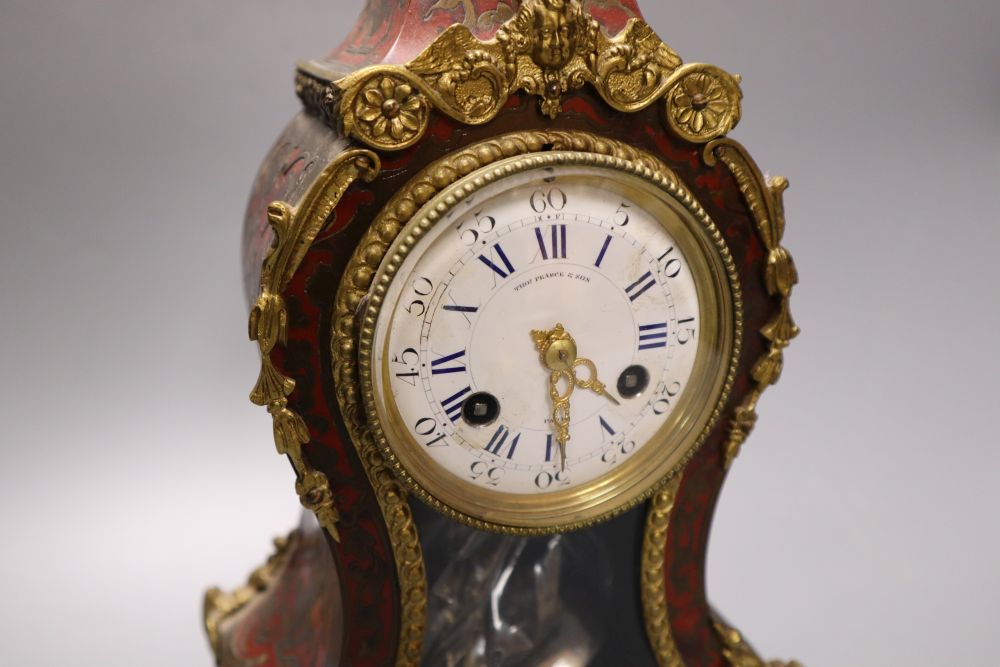 A 19th century French boullework and ormolu mounted mantel clock, dial signed by retailer Thos. - Image 2 of 8