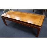 A Chinese hardwood coffee table, width 122cm, depth 46cm, height 40cm