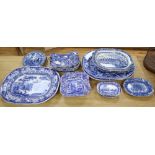 A collection of 19th / 20th century blue and white pottery including meat platters, dishes, bowls,