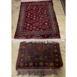 A Bokhara rug and a Turkish geometric rug, larger 150 x 100cm