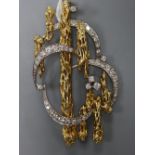 A mid 1970's 18ct two colour gold and graduated diamond set naturalistic brooch, 52mm, gross 14.2