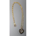 A 9ct gold, sapphire and diamond heart-shaped pendant on 9ct gold fine chain, pendant 22mm, gross