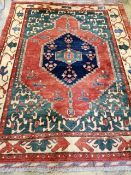 A Caucasian style small carpet, 240 x 180cm