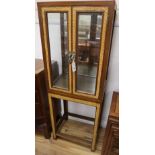 A Chinese hardwood display cabinet, width 51cm, depth 38cm, height 143cm