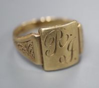 A 9ct yellow gold signet ring, the rectangular matrix initialled 'RJ', size S, 4.9 grams.