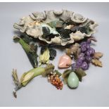 A Chinese soapstone 'lotus' dish containing hardstone models of fruit and a hardstone model of