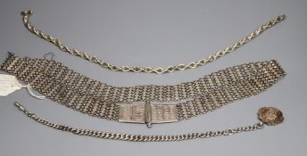 An Indian white metal belt and two alberts including silver and a silver and yellow metal