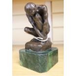 After A. Rodin. A bronze crouching male nude, height 16cm