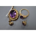 A modern 9ct gold, amethyst and seed pearl set oval pendant, a pair of 9ct and amethyst earstuds and