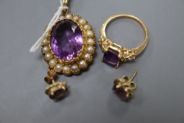 A modern 9ct gold, amethyst and seed pearl set oval pendant, a pair of 9ct and amethyst earstuds and