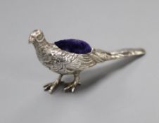 An Edwardian novelty silver pin cushion, modelled as a pheasant, import marks for Glasgow, 1907,