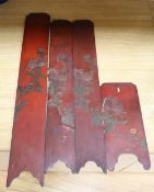 Four Japanese red lacquered hardwood panels, decorated with chrysanthemums, largest panel height