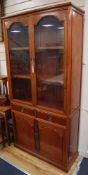 A Chinese hardwood cabinet, width 92cm, depth 35cm, height 183cm