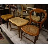 A carved bleached mahogany caned stool and two Victorian chairs