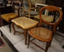 A carved bleached mahogany caned stool and two Victorian chairs