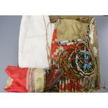 A native North American North Plains beaded leather pouch, a pair of Chinese embroidered shoes,