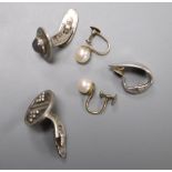 Two Georg Jensen sterling cufflinks, a similar ear clip and a pair of cultured pearl earrings.