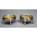 Two similar mid 18th century silver oval salts, London, 1753? and 1762, marks rubbed, length 8.