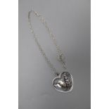 A George Jensen sterling 'Robin & fearn' heart shaped pendant, with white metal necklace, no. 97,