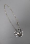 A George Jensen sterling 'Robin & fearn' heart shaped pendant, with white metal necklace, no. 97,