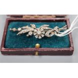 A Victorian yellow and white metal, diamond set floral spray brooch, 58mm, gross 7.5 grams.