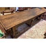 A 17th century style oak refectory table, width 262cm, depth 71cm, height 75cm