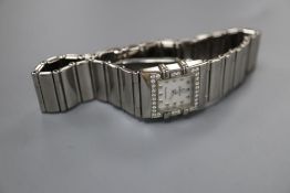 A lady's stainless steel Omega Constellation quartz? wrist watch, with square mother of pearl dial