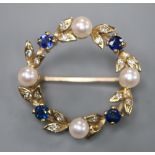 A modern 9ct gold, cultured pearl, sapphire and diamond set openwork brooch, 24mm, gross 4.1 grams.