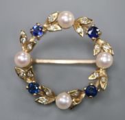 A modern 9ct gold, cultured pearl, sapphire and diamond set openwork brooch, 24mm, gross 4.1 grams.