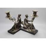 A pair of Regency bronzed plaster figural candlesticks, height 27cm