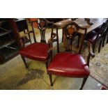 A set of eight George III inlaid mahogany dining chairs (2 with arms)