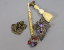 An ivory handle seal and a silver and enamel crucifix, a Victorian bone bobbin personalised