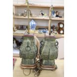 A pair of Chinese archaistic bronze lamps, height 47cm excl. light fitting