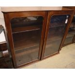 A Victorian mahogany two door bookcase, width 115cm, depth 30cm, height 104cm