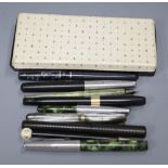 A cased Parker 17 fountain pen and pencil set and other fountain pens