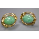 A pair of 585 yellow metal and oval cabochon jade set cufflinks, gross 12.2 grams, cabochon size