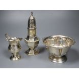 A George V silver sugar caster, later cream jug and Edwardian sugar bowl, 11.5oz.