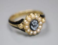 A Victorian 18ct gold, black enamel, seed pear and hardstone set oval mourning ring, inscribed '