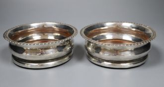 A pair of George IV silver wine coaster with tuned wooden bases, Adey Bellamy Savory, London,