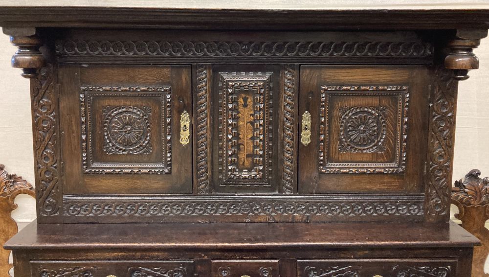 A late 18th century carved oak court cupboard, width 130cm, depth 52cm, height 170cm - Image 3 of 5