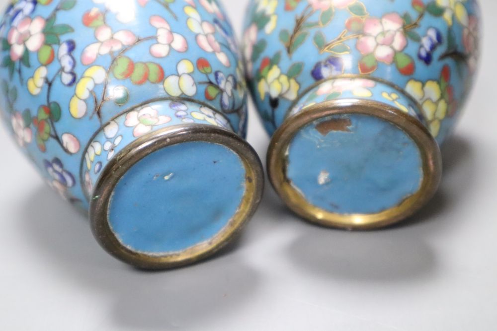 A pair of small Chinese cloisonne vases, 13cmCONDITION: One vase with two dents with damage to - Image 3 of 3