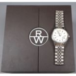A gentleman's modern stainless steel Raymond Weil automatic wrist watch, with original box.