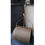 A Victorian cast iron garden roller, width 78cm, height 170cm