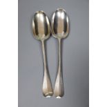 Two early 18th century silver Hanovarian rat tail pattern table spoons, William Scarlett, London,