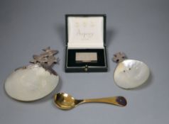 A modern cased Asprey & Co silver pill box, 51mm, a Jensen gilt sterling '1977' spoon and two